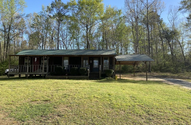 Enjoy our stocked lake and 28 miles to The University of Alabama for football!