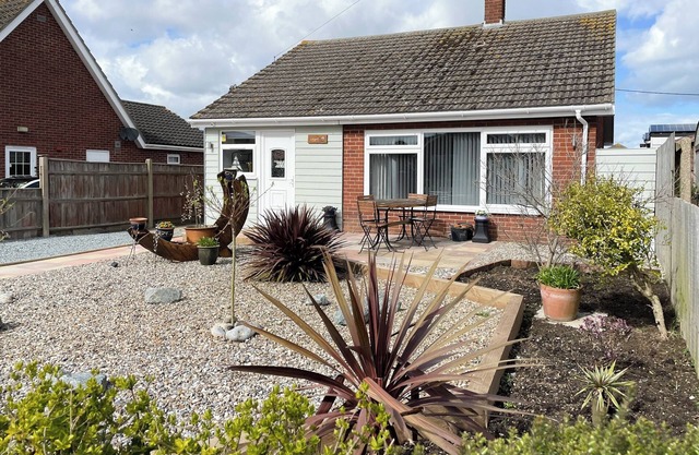 Enjoy the seaside with just a short walk to a wonderful, sandy beach.