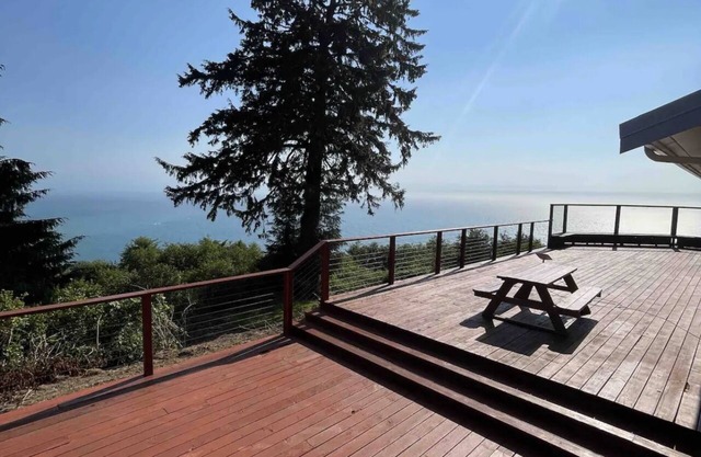 Escape to our spacious 4 bed 2-bath house with stunning ocean and river views