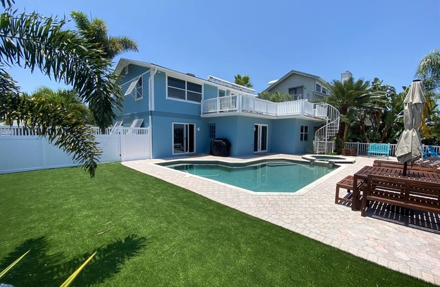 Escape to Paradise: Luxe Waterfront 3BR/3BA w/Pool, Hot Tub & Fishing Dock