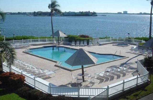 Escape To This Picturesque Bay Front Condo, Perfect For Couples Or Families.