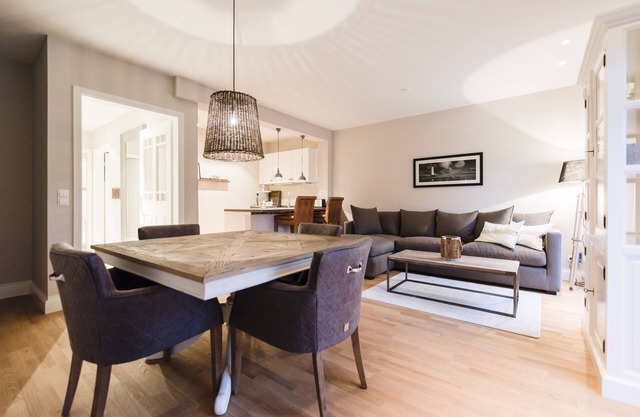 Exclusive apartment with water view, terrace, fireplace and daily cleaning