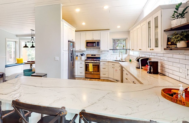 Expansive Mountain-View Gem on Serene Half-Acre | Near Skiing, Golf & Beaches