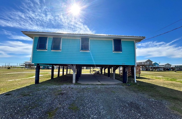 Experience coastal charm at Blue Heron, a spacious 4-bedroom retreat in Grand Isle, LA.