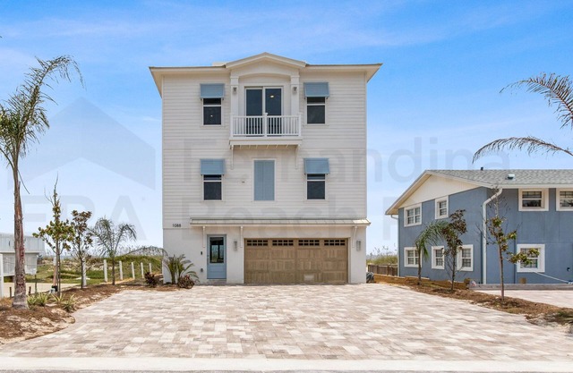 Experience oceanfront luxury at 1088 S. Fletcher Ave, a spacious 5-bedroom house