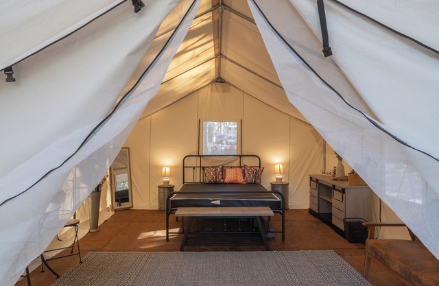Experience the perfect blend of camping at the Rocky Top Retreat Glamping Tent.
