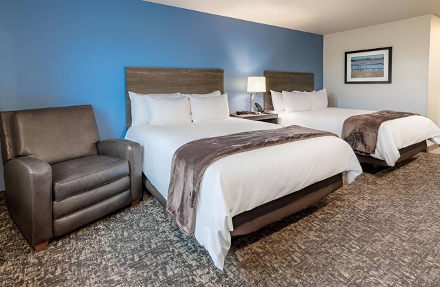 Extended Stay Comfort in Room with Full Kitchen Near Zing Zumm Children's Museum