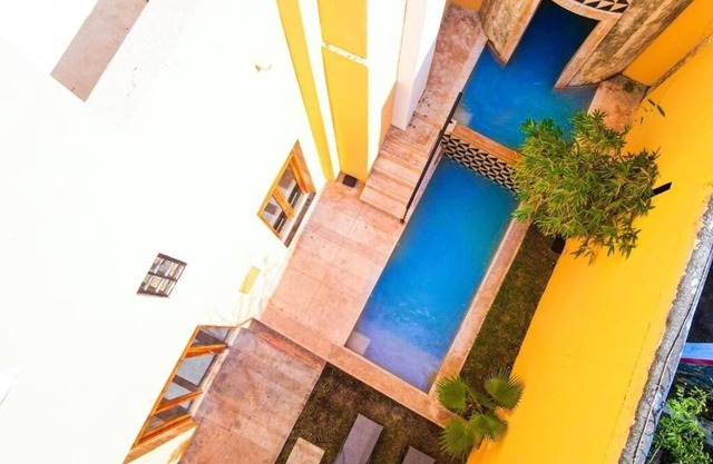 Family-Friendly Mérida Stay – 2 Double Rooms with Pool, Courtyard, & City Access