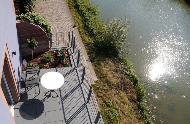 Fantastic apartments with a sun terrace directly on the shores Tauber