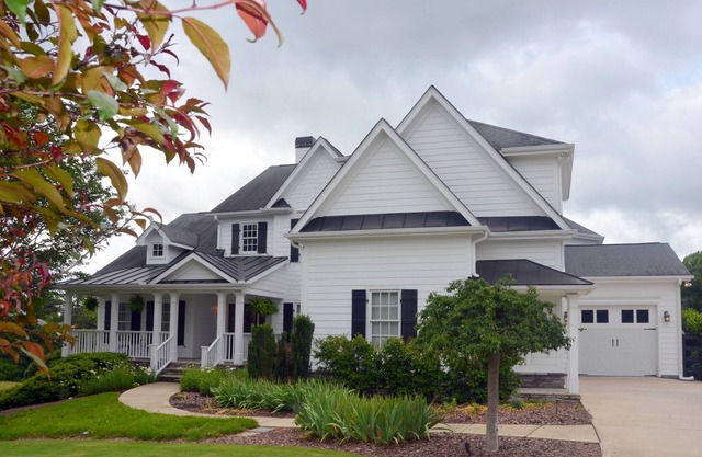 Farm Style home with a pool and game room to stretch out and have family fun.