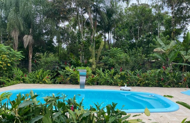 Farm with swimming pool. Waterfall 200 meters away, in the Caiubura Condominium Bertioga, SP