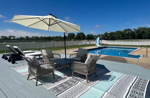 Farmhouse with Heated Pool on almost 160 Acres!