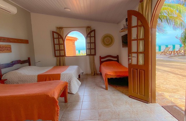 Feet in the sand at Garça beach in Maceió-AL