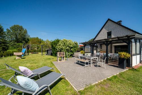 Ferienhaus Landlust - Erholung mit Fasssauna und Whirlpool nahe Binz!