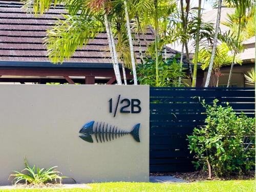 Fish on a Fence - Absolute Beachfront