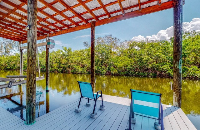 Fishing getaway with a pool, hot tub, game room, dock, and grill - dog-friendly