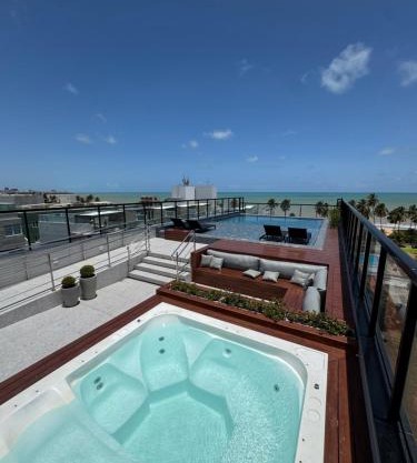 Flat piscina borda infinita a 50m do mar - 214