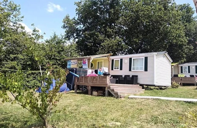 Flower Camping Le Lac aux Birds * - Mobile home Comfort 30 m2 (3 bedrooms) + Clim + semi-covered terrace 10m2 6 people
