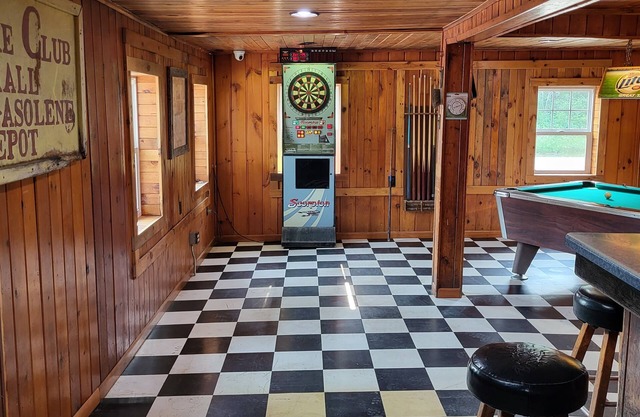 Former bar with games, multiple kitchens, 5 bedrooms, sleeps 14.
