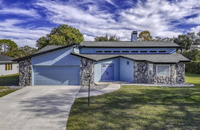 Four Beds, three baths, heated pool, and a Golf Course. What more do you need!