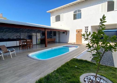 FRENTE MAR CASTELHANOS Casa Recanto Azul 7 Suítes Lazer Completo e Conforto recém reformada para Até 25 Pessoas Ideal para reunir Famílias e Amigos