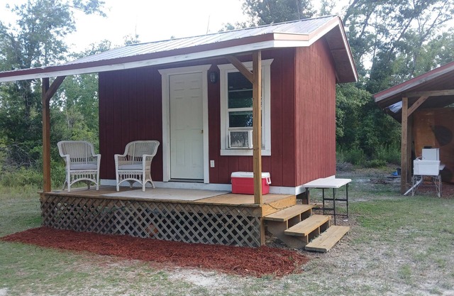 Friendlys River Retreat private nRustic Camping Cabin sleeps 4+with tent camping