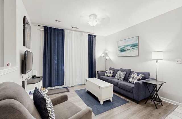 Fully-furnished first-floor condo with pool & private washer/dryer- dog-friendly