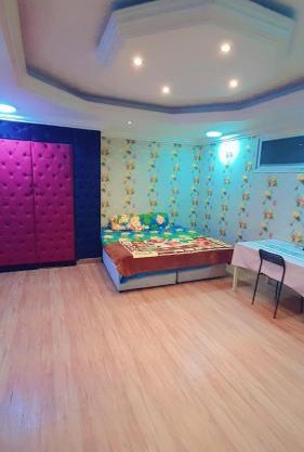 Furnished Bedroom with attached bath in Villa in sharjah