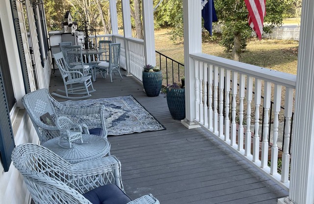 Gated property with historic main home + charming cottage.