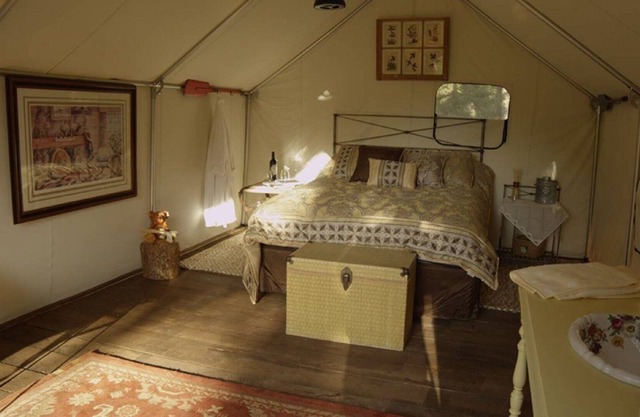 Glamp in a Wall Tent furnished w/a Double and Twin beds at Norwegian Wood Ranch