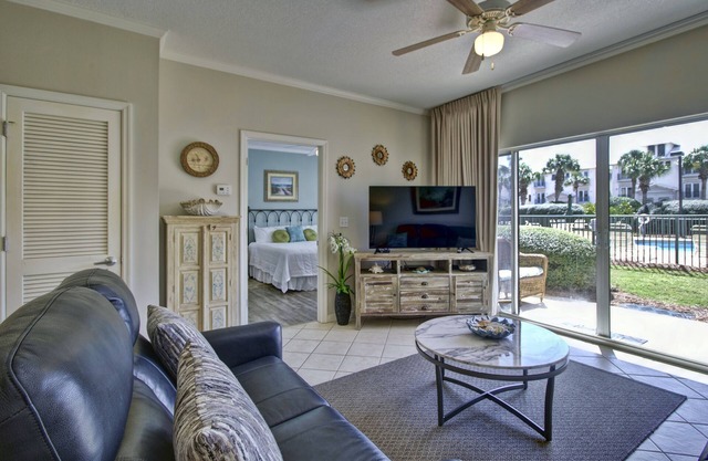 Gorgeous 2 BDRM condo steps to private beach! Walk right out patio to pool
