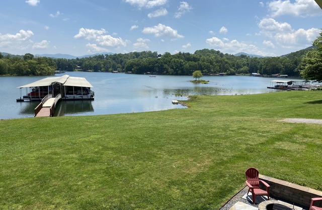 GORGEOUS YEAR ROUND LAKE FRONT RETREAT with BOAT SLIP!