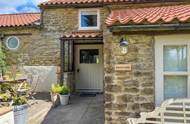 Grain End Cottage is set in large landscaped gardens.