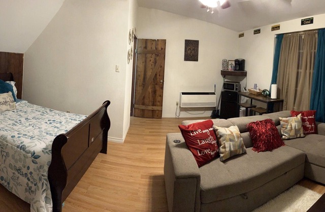 GREAT STUDIO SUITE...above garage suite over looking pool