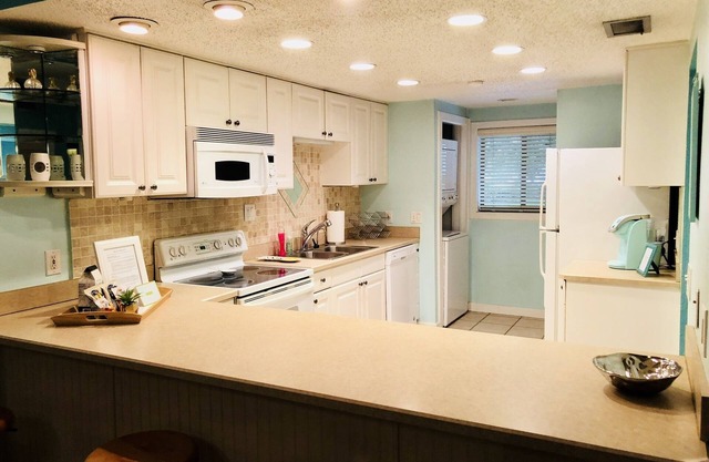 Greatest location! Condo with private yard!