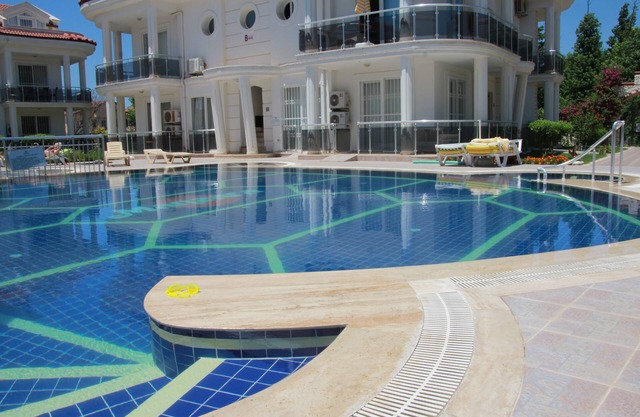 Ground Floor Apartment on a private complex with gardens and swimming pool