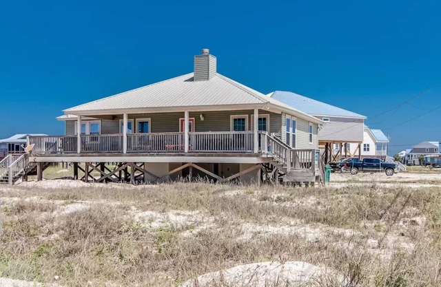 Gulf Front! 2 Master Suites- Steps Away from the Beach!