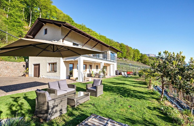 Holiday Apartment 'Weitblick Kaltern' with Mountain View, Private Terrace, and Garden