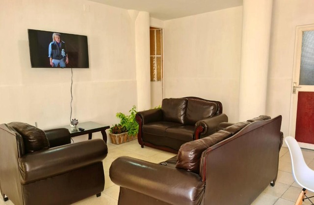 Habitación privada en departamento céntrico (rojo)