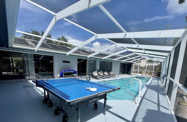 Handicap accessible Mid-Mod home w/ pool, near beach & boat access.
