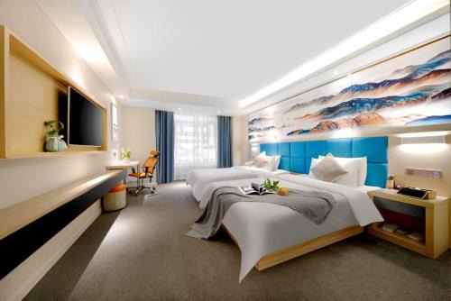 Happy Manju Hotel-Harbin Haxi High-speed Railway West Station Wanda Plaza Branch
