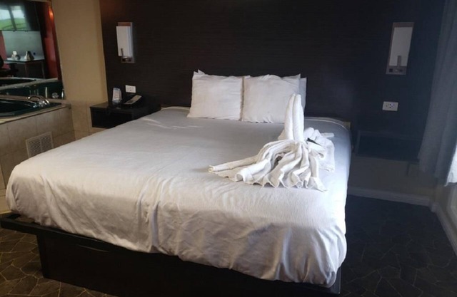 Heart Shape Jetted Tub King Bed at Envi Boutique Hotel