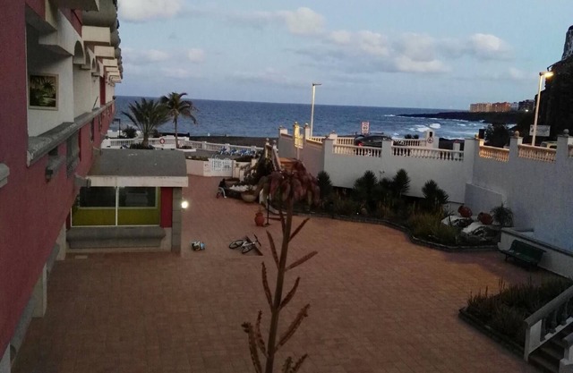 Holiday flat with a balcony in a complex with a community pool by the sea