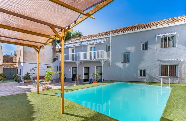 Holiday Home "Alojamientos Sierra Nevada Viva" with Mountain View, Shared Pool & Wi-Fi