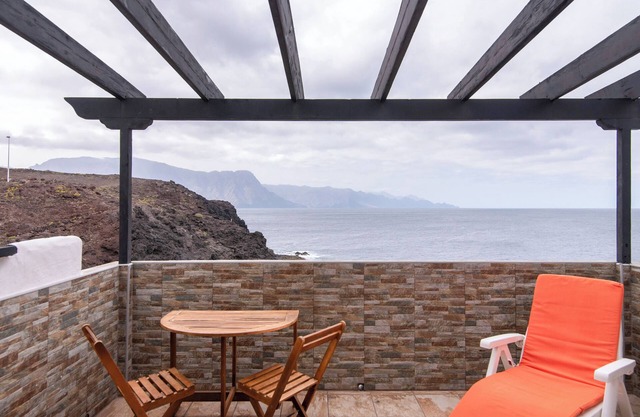 Holiday Home "Faro de Sardina Frente al Mar" with Sea View, Pool & Wi-Fi