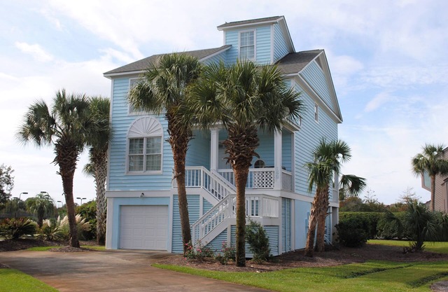 Home featuring ocean vista with pool access located within Litchfield By the Sea.