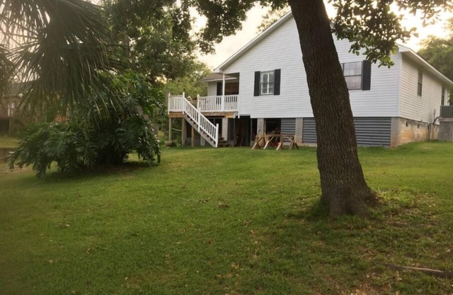 Home just off East Fowl River on deep water canal