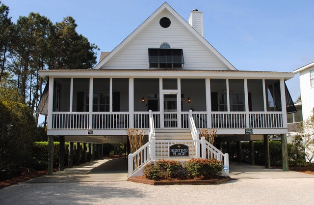 Home with screened porch, deck, hammock and easy beach access located at North Litchfield Beach.