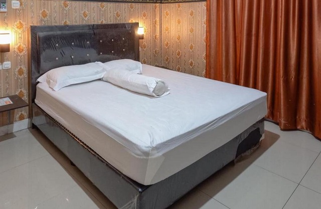 Homestay Singgasana Mitra RedDoorz