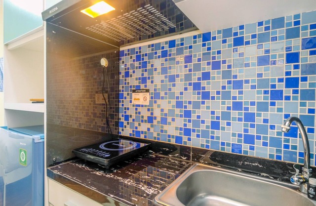 Homey And Cozy Living Studio Room At Tifolia Apartment